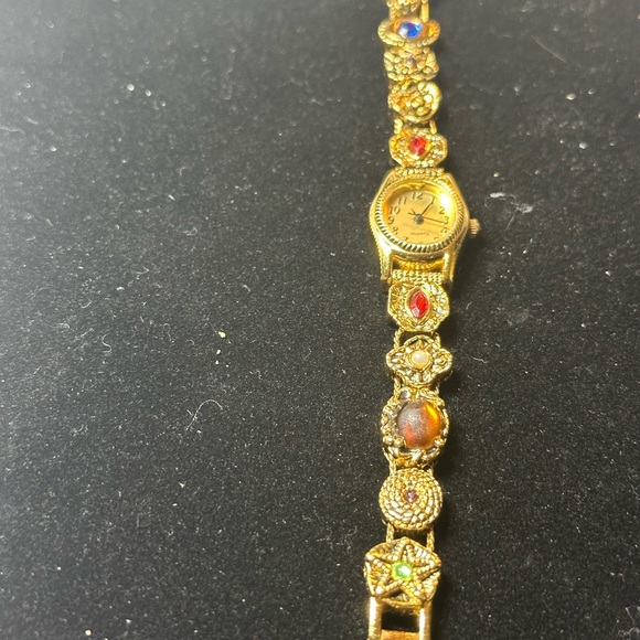 Avon vintage GRUNGE QUARTZ WATCH SLIDE CHARM BRACELET GOLD TONE- collectables - Picture 14 of 17